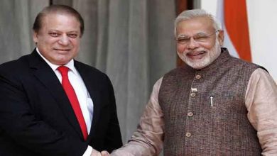 PM Narendra Modi exchanges pleasantries with Nawaz Sharif