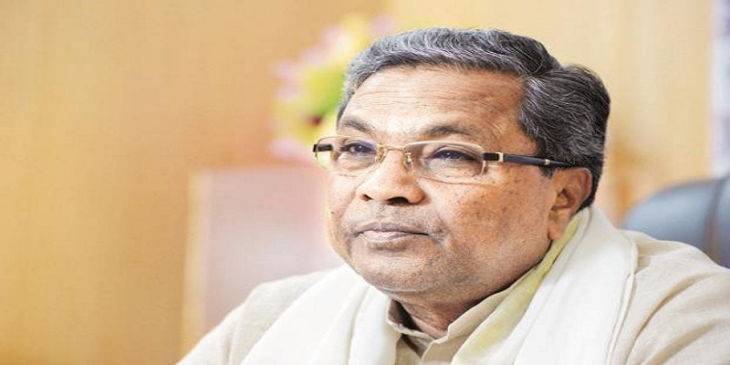 karnataka-cm-siddaramiah-in-trouble-after-giving-money-to-supporters