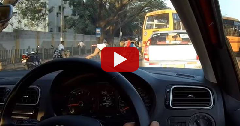 traffic police hurls shoe